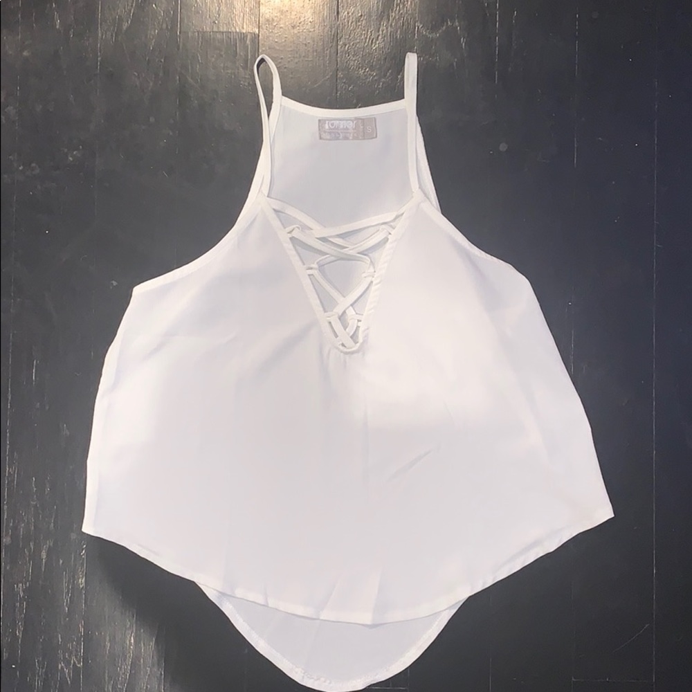 White sleeveless top